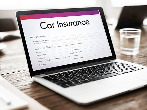 A laptop showing auto insurance comparison on a screen, symbolizing a smart choice.